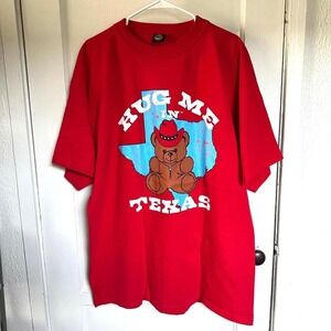 "Hug Me‎ in Texas" cowboy bear graphic.